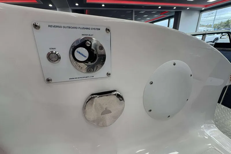Slide: The Image of 2024 Fountain 38 SC boat with Reverso outboard flushing system panel. - 45