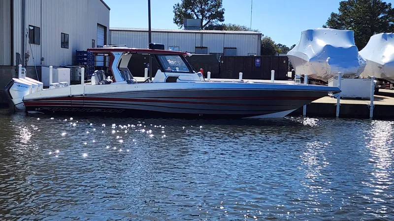 The Image of 2024 Fountain 38 SCX boat docked at a marina. - 1