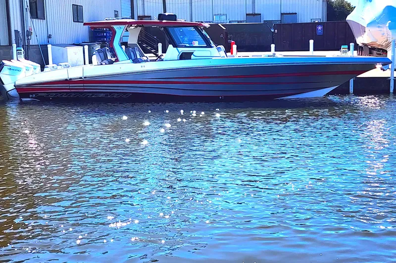 Slide: The Image of 2024 Fountain 38 SCX boat docked in marina. - 22