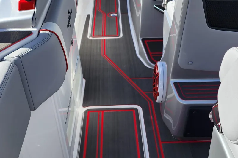 Slide: The Image of Interior of 2024 Fountain 38 SCX boat with sleek, modern design and red accents. - 23