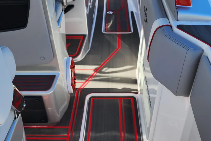 Slide: The Image of 2024 Fountain 38 SCX boat interior with modern design and red accents. - 24