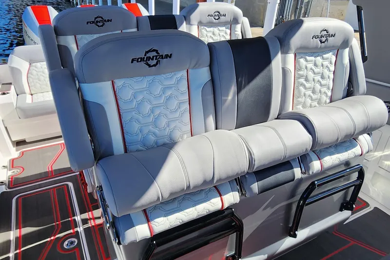 Slide: The Image of 2024 Fountain 38 SCX boat seats with premium upholstery and logo. - 25