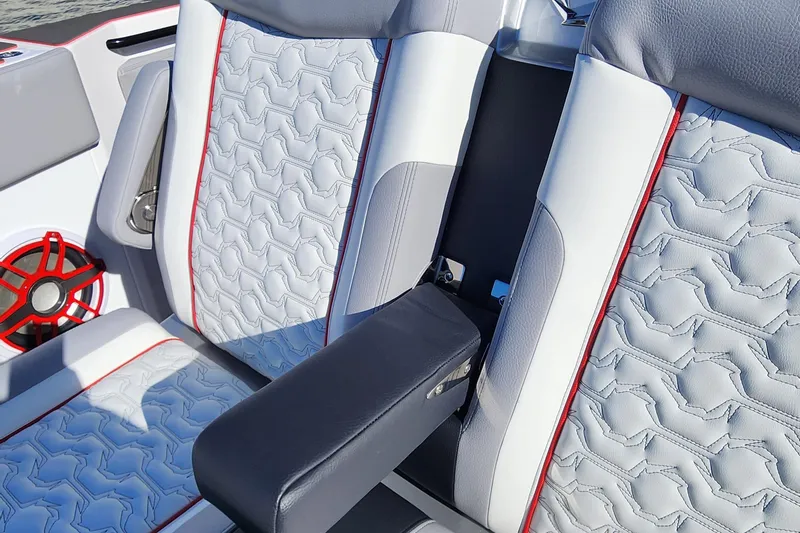 Slide: The Image of Luxury seating on the 2024 Fountain 38 SCX boat with detailed stitching and red accents. - 28