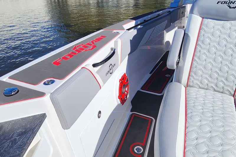 Slide: The Image of 2024 Fountain 38 SCX boat interior with white and red accents. - 29
