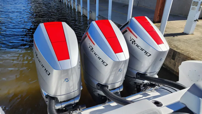 Slide: The Image of 2024 Fountain 38 SCX with triple Mercury Racing outboard engines. - 3