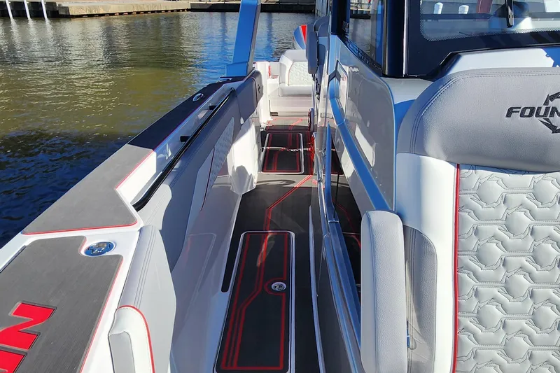 Slide: The Image of 2024 Fountain 38 SCX boat interior with modern seating and sleek design. - 30