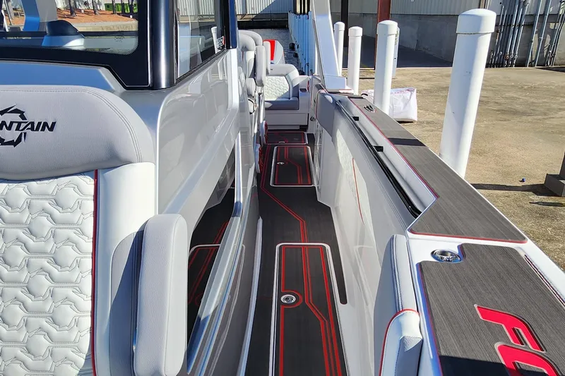Slide: The Image of 2024 Fountain 38 SCX boat interior with sleek design and modern seating. - 31