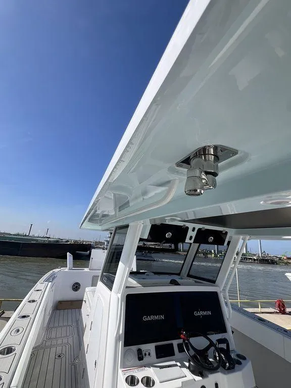 Slide: The Image of 2024 Twin Vee 400 Center Console GFX boat with Garmin navigation system. - 23
