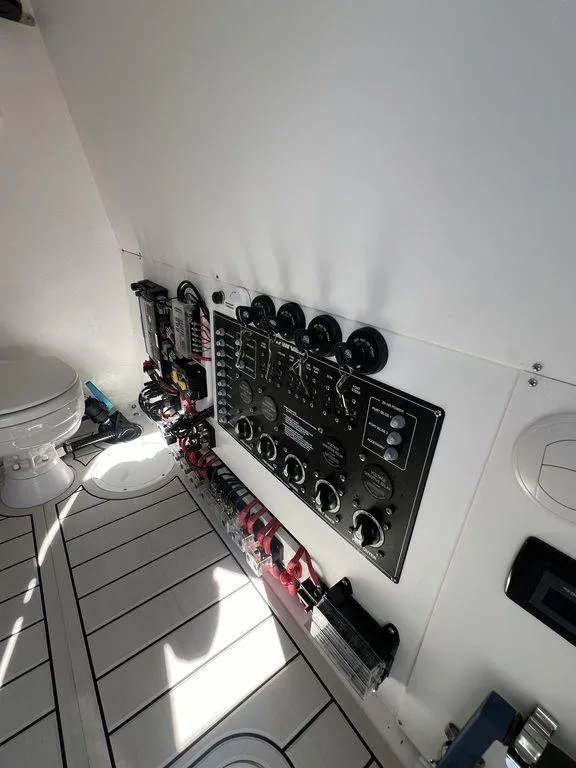 Slide: The Image of 2024 Twin Vee 400 Center Console GFX control panel and interior. - 34