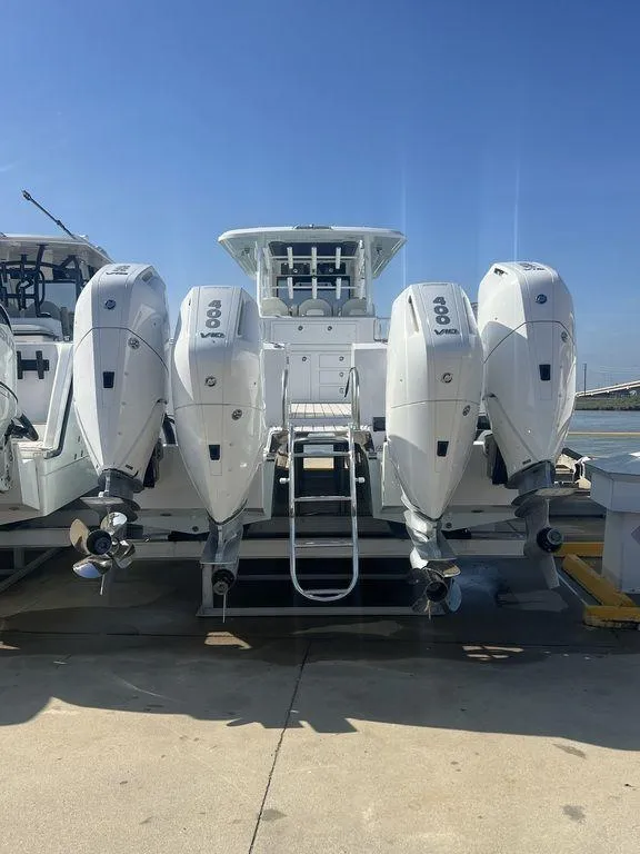 Slide: The Image of 2024 Twin Vee 400 Center Console GFX with quad outboard engines. - 5