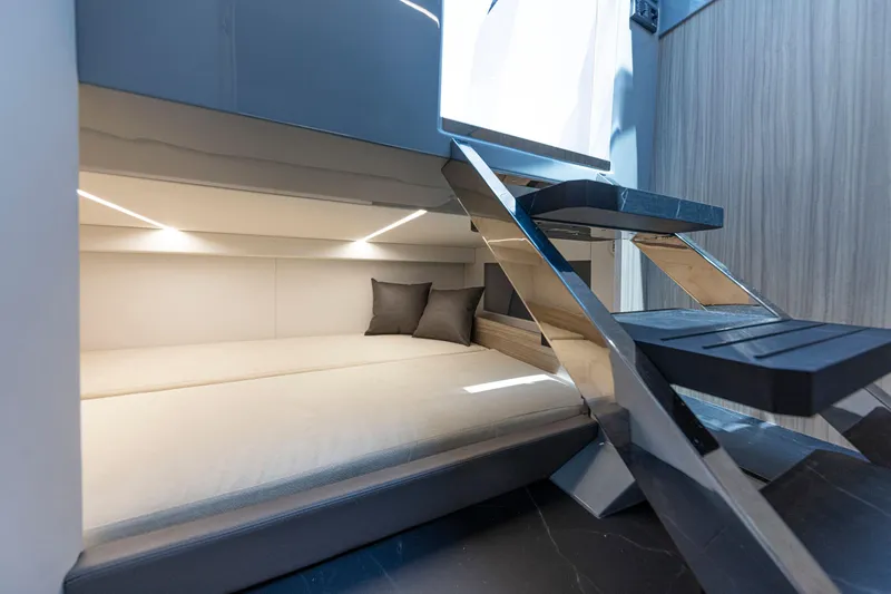 Slide: The Image of 2024 Rio Yachts Daytona 35 interior cabin with modern bunk bed and sleek design. - 34