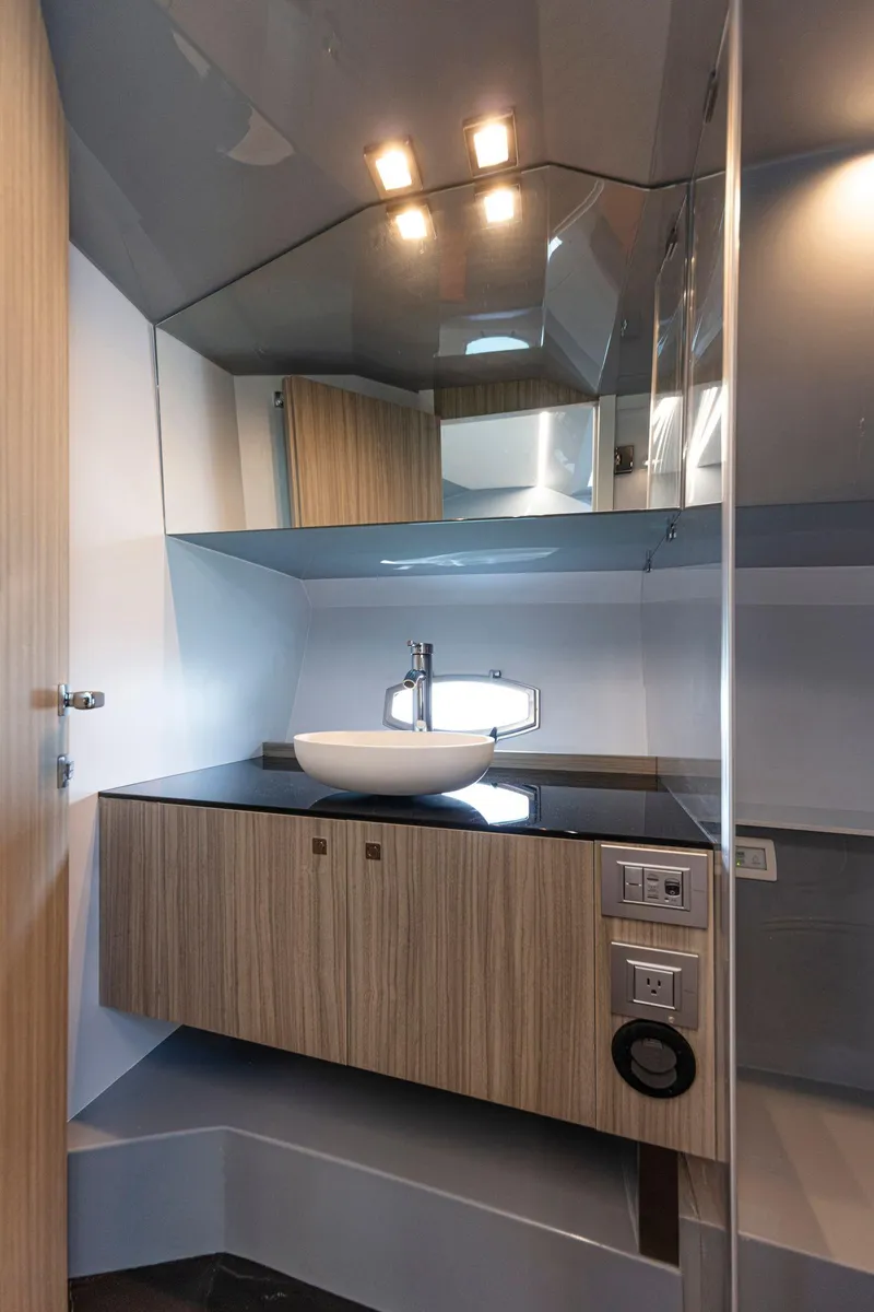 Slide: The Image of Modern bathroom interior of 2024 Rio Yachts Daytona 35, featuring sleek design and ambient lighting. - 35