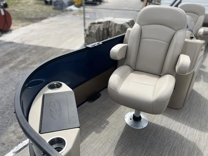 Slide: The Image of 2024 Bentley Pontoons Fish 203 Center Walk-Thru 3/4 Tube, beige captain's chair, cup holders. - 10