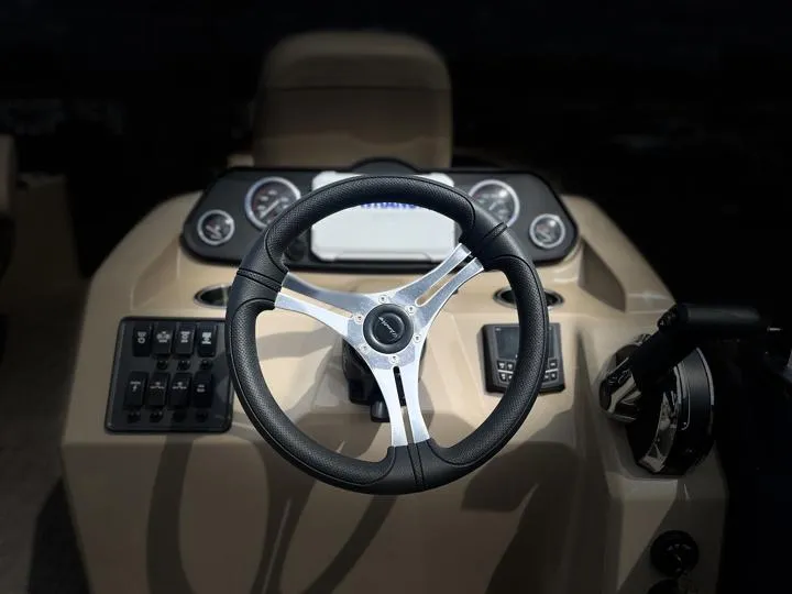 Slide: The Image of 2024 Bentley Pontoons Fish 203 Center Walk-Thru 3/4 Tube steering console. - 22