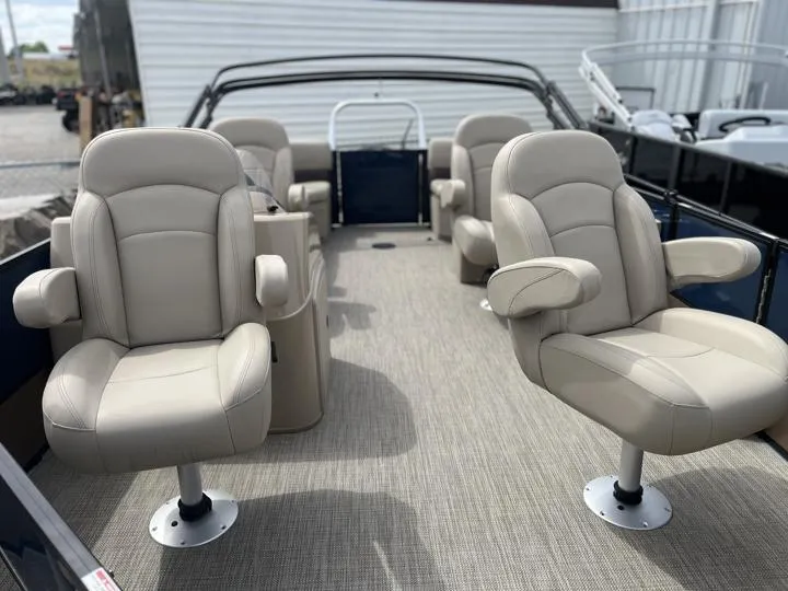 Slide: The Image of 2024 Bentley Pontoons Fish 203 Center Walk-Thru 3/4 Tube interior with beige seating. - 8