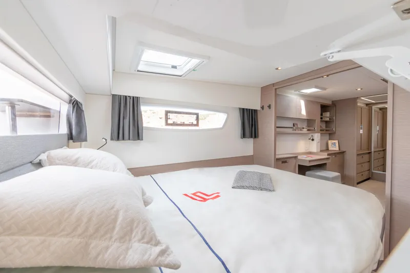 Slide: The Image of Luxurious bedroom interior of 2024 Fountaine Pajot Elba 45 catamaran. - 9