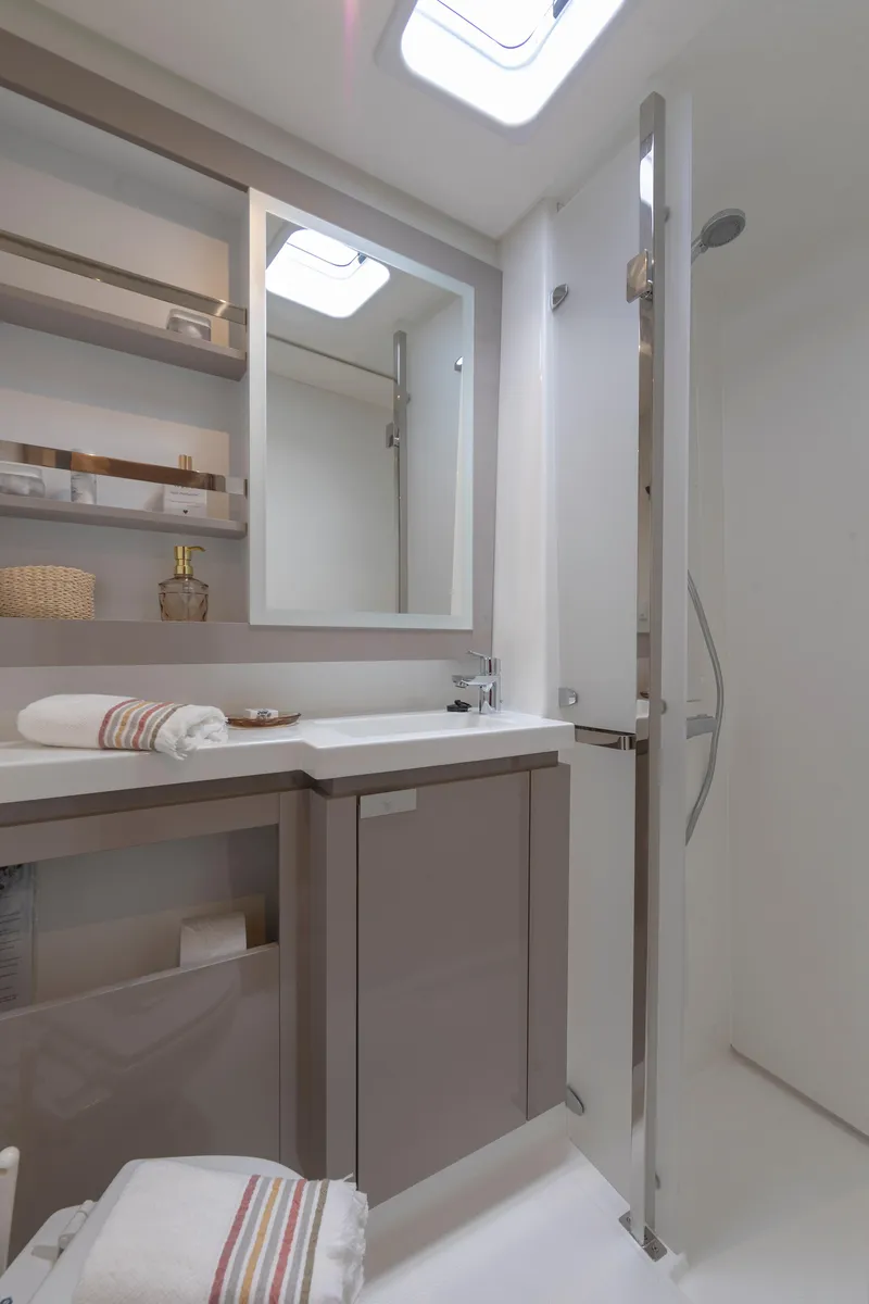 Slide: The Image of 2024 Fountaine Pajot Elba 45 yacht bathroom with modern fixtures and sleek design. - 7