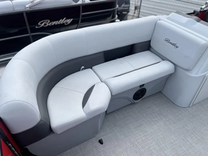 Slide: The Image of 2024 Bentley Pontoons LE 160 CR interior seating with gray upholstery. - 10