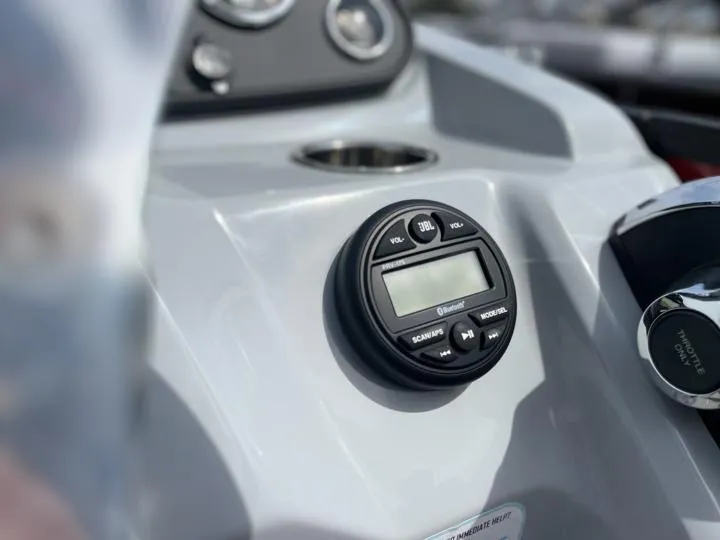 Slide: The Image of Close-up of the 2024 Bentley Pontoons LE 160 CR dashboard controls. - 20