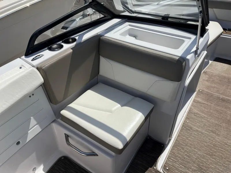 Slide: The Image of 2018 Glastron GTD boat interior seating and storage area. - 10