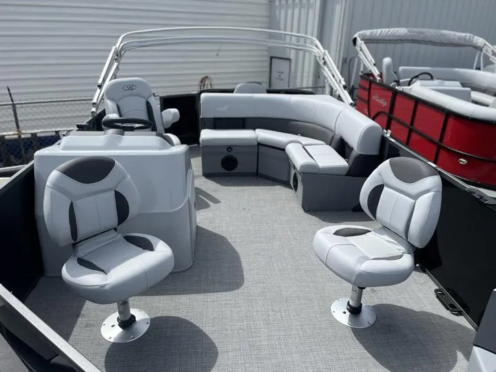 Slide: The Image of 2024 Bentley Pontoons LE 180 3 PT interior with seating and steering console. - 12