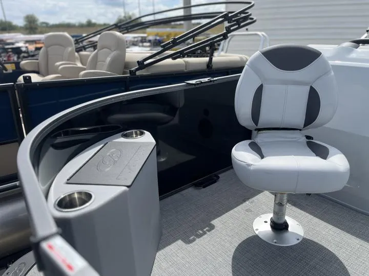 Slide: The Image of 2024 Bentley Pontoons LE 180 3 PT interior with seating and cup holders. - 14