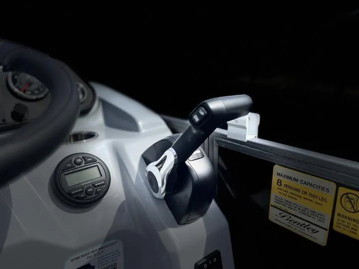 Slide: The Image of Close-up of the control panel and throttle of a 2024 Bentley Pontoons LE 180 3 PT. - 26