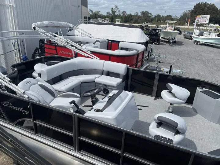Slide: The Image of 2024 Bentley Pontoons LE 180 3 PT pontoon boat with spacious seating and modern design. - 9