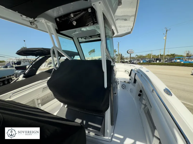 Slide: The Image of 2024 Blackfin 302CC center console boat, exterior view, Sovereign Yachts. - 16