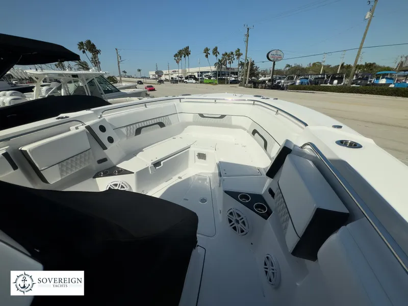 Slide: The Image of 2024 Blackfin 302CC boat interior with seating and storage compartments. - 17