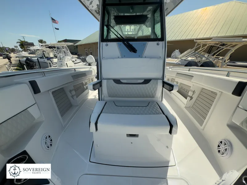 Slide: The Image of 2024 Blackfin 302CC center console boat interior at Sovereign Yachts. - 22