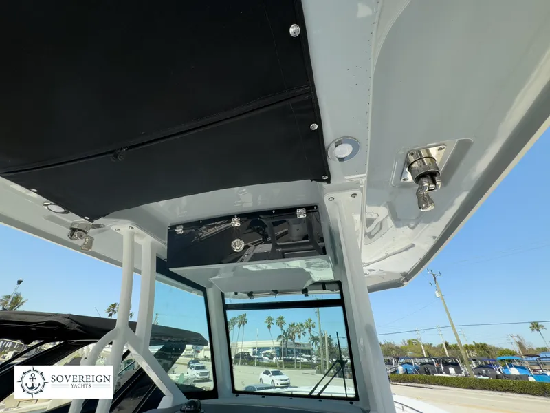 Slide: The Image of 2024 Blackfin 302CC boat interior with Sovereign Yachts logo. - 29