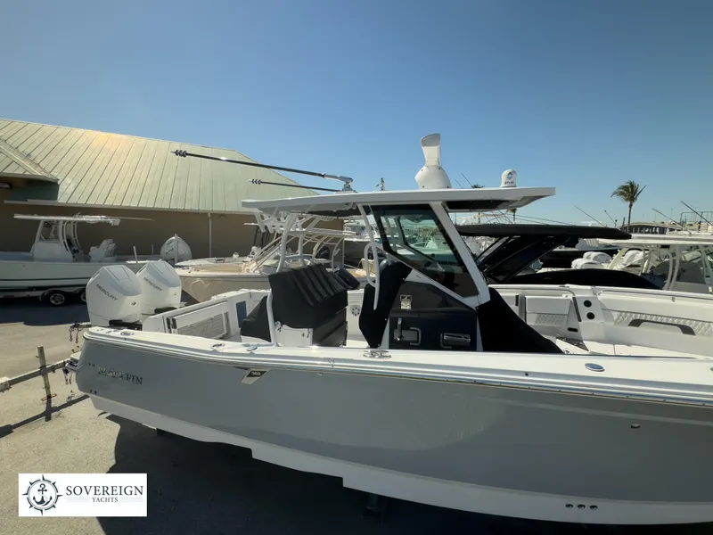 Slide: The Image of 2024 Blackfin 302CC center console boat at Sovereign Yachts dealership. - 3