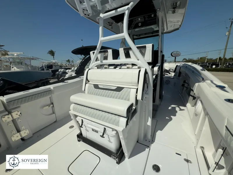 Slide: The Image of 2024 Blackfin 302CC center console boat interior with seating and storage. - 32