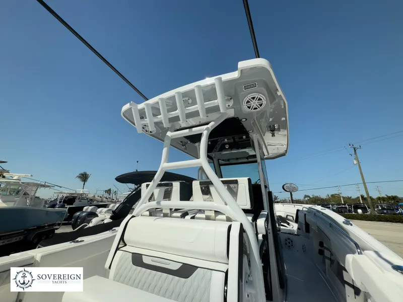 Slide: The Image of 2024 Blackfin 302CC center console boat at Sovereign Yachts dealership. - 33
