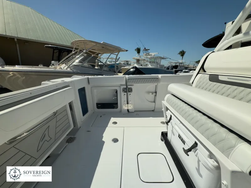 Slide: The Image of 2024 Blackfin 302CC boat interior at Sovereign Yachts dealership. - 34