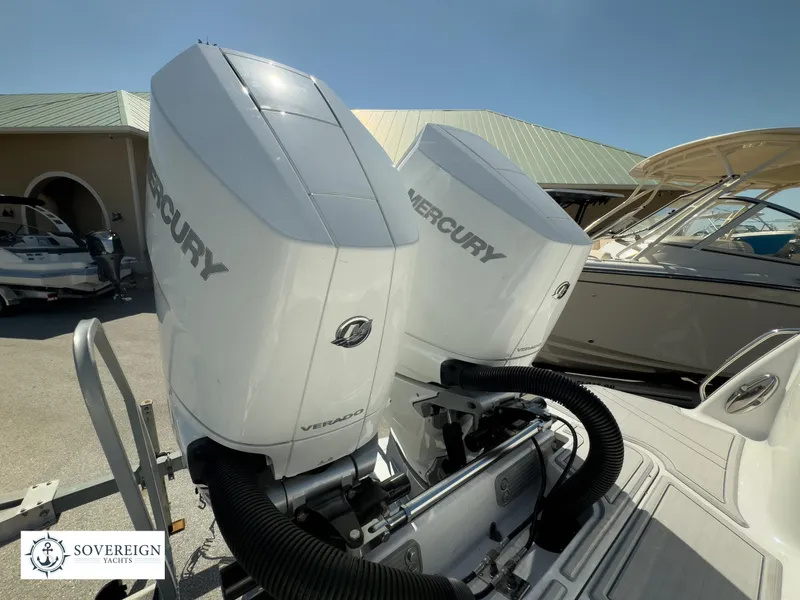 Slide: The Image of 2024 Blackfin 302CC boat with twin Mercury outboard engines at Sovereign Yachts. - 36