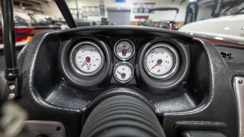 Slide: The Image of 2024 Lund 2025 Impact XS Sport dashboard with gauges and controls. - 18