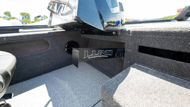 Slide: The Image of 2024 Lund 1875 Pro-V Bass XS interior detail with logo. - 13