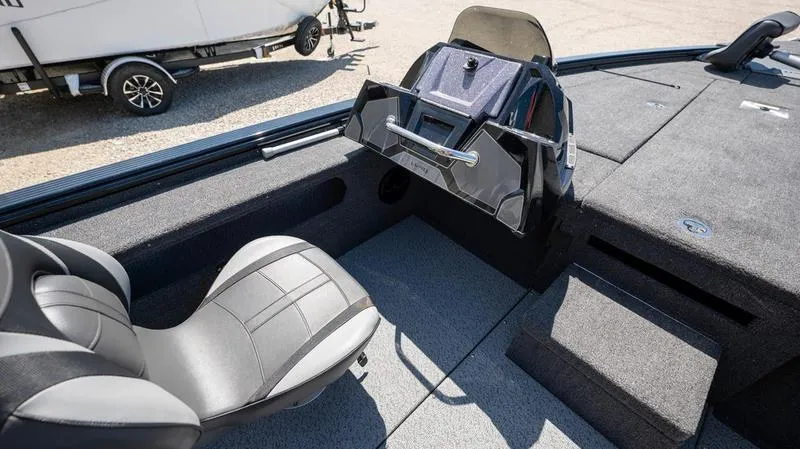 Slide: The Image of 2024 Lund 1875 Pro-V Bass XS boat interior with steering console and seating. - 20