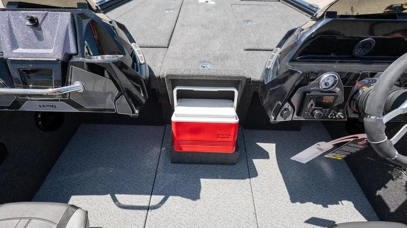 Slide: The Image of Interior of 2024 Lund 1875 Pro-V Bass XS boat with red cooler. - 21