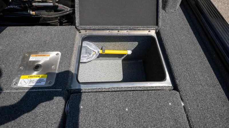 Slide: The Image of 2024 Lund 1875 Pro-V Bass XS storage compartment with fishing net. - 24