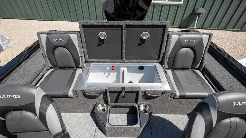 Slide: The Image of 2024 Lund 1875 Pro-V Bass XS boat interior with seating and storage compartments. - 30