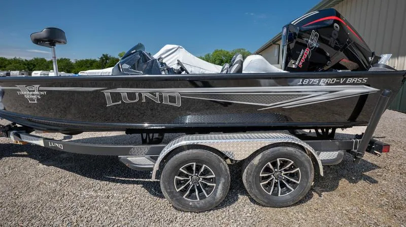 Slide: The Image of 2024 Lund 1875 Pro-V Bass XS fishing boat on a trailer. - 7