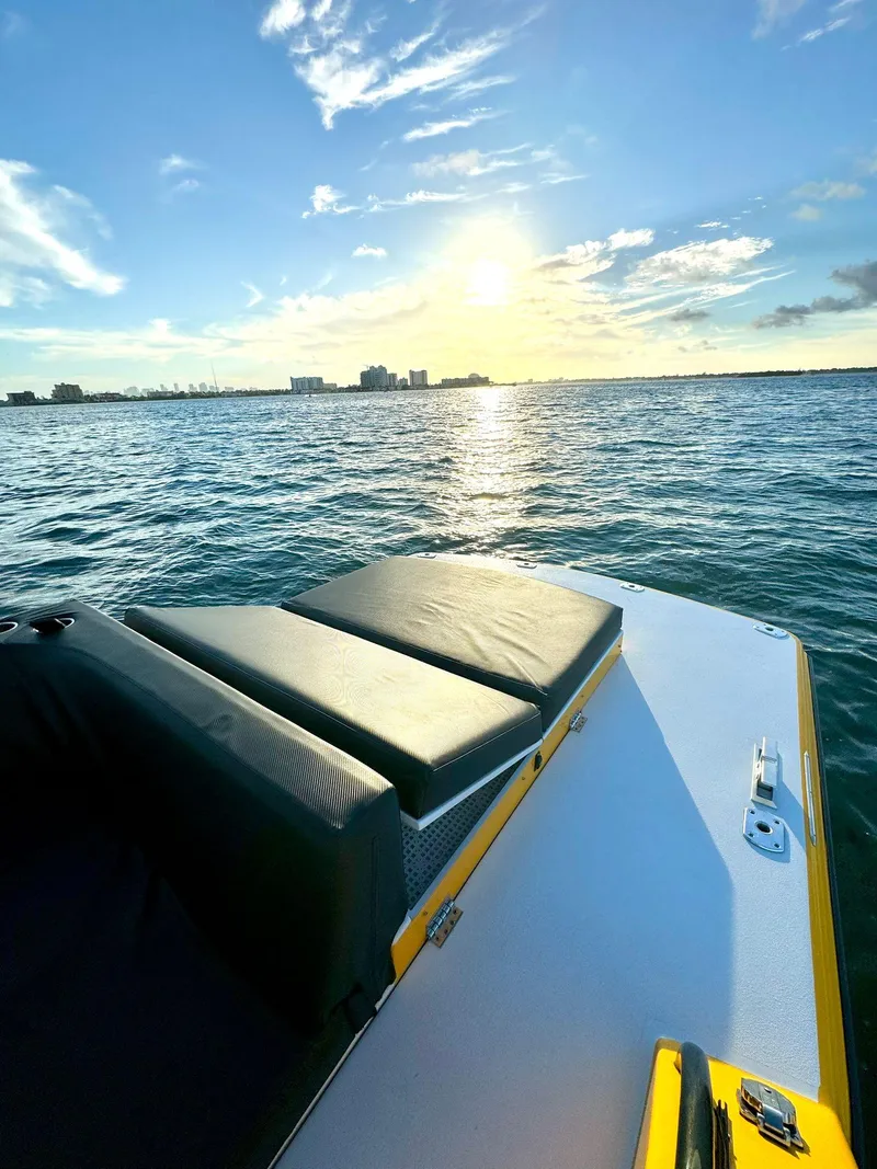 Slide: The Image of 2023 VanDutch Sport 35 yacht on the water at sunset. - 3