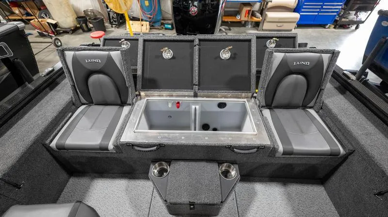 Slide: The Image of 2024 Lund 1875 Pro-V Bass XS boat interior with storage compartments and seating. - 16