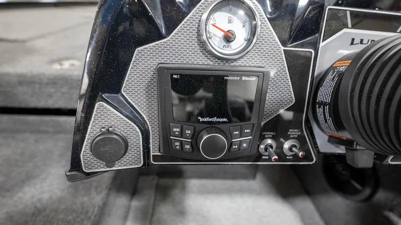 Slide: The Image of Dashboard of 2024 Lund 1875 Pro-V Bass XS boat with fuel gauge and audio controls. - 20