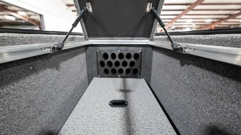 Slide: The Image of 2024 Lund 1875 Pro-V Bass XS storage compartment with rod holders. - 26