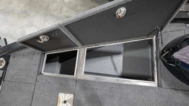 Slide: The Image of 2024 Lund 1875 Pro-V Bass XS storage compartments on deck. - 31