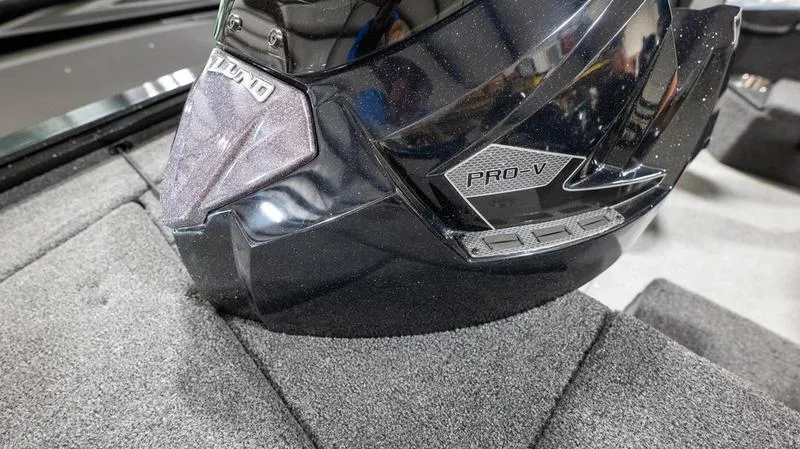 Slide: The Image of 2024 Lund 1875 Pro-V Bass XS boat interior detail with Pro-V logo. - 32